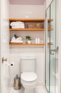 flux schnell small guest bathroom with warmtoned floating wood 3